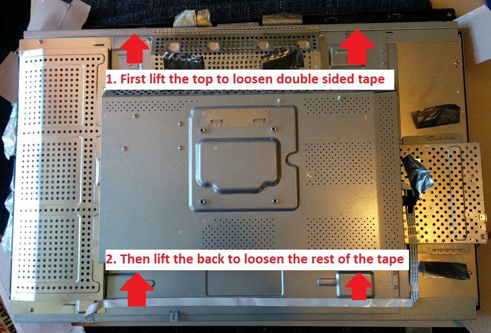 Carefully lift the backpanel