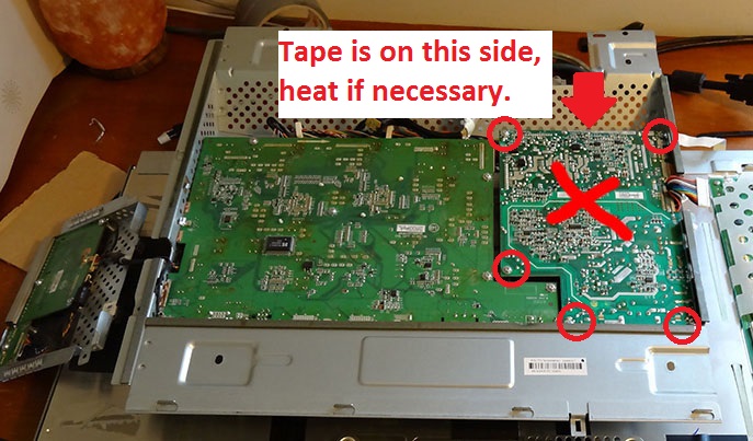 Unscrew the board and remove. Image courtesy of Embalse (forums.overclockers.co.uk)